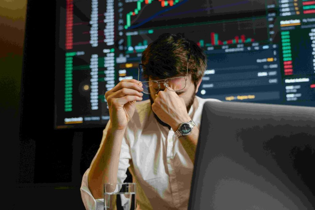 man looking upset when stocks fall, showing market volatility