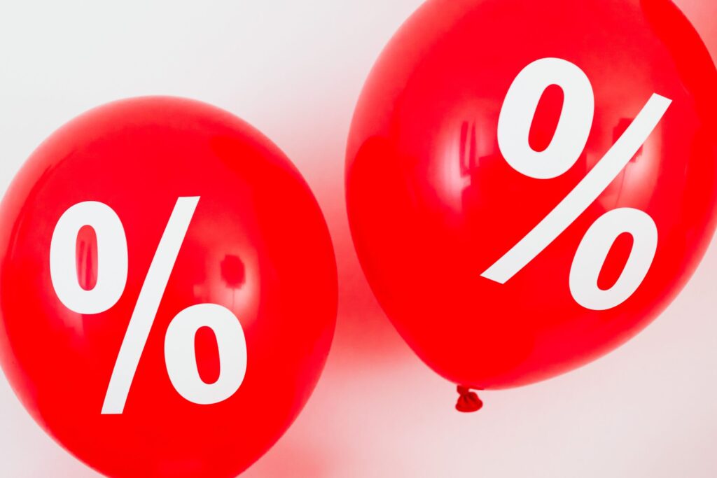 balloons with percentages on them, showing ratios